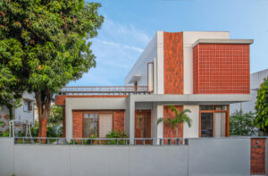 Front view of Lakulish – A Terracotta Abode showcasing traditional terracotta architecture in Alkapuri, Vadodara.